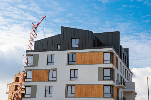 istock Construction of a large house. Crane and building 1438975822