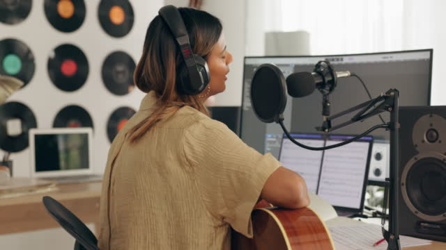 Guitar, singer or woman with microphone in studio for music, jazz or audio production for concert, event or radio. Podcast, influencer or creative musician girl for live streaming singing performance