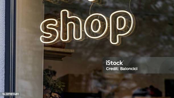 Neon Sign Shop Stock Photo - Download Image Now - 2022, Budapest, Built Structure