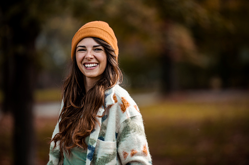 Autumn photo of a beautiful girl