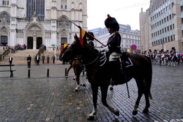 Royal Horse Guards during a ceremony Royal Horse Guards during a ceremony  in front of S t Michael and St Gudula Cathedral in Brussels, Belgium on July 21, 2022. song title stock pictures, royalty-free photos & images