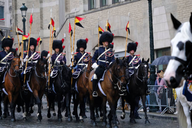 Royal Horse Guards during a ceremony Royal Horse Guards during a ceremony  in front of S t Michael and St Gudula Cathedral in Brussels, Belgium on July 21, 2022. song title stock pictures, royalty-free photos & images