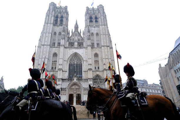 Royal Horse Guards during a ceremony Royal Horse Guards during a ceremony  in front of S t Michael and St Gudula Cathedral in Brussels, Belgium on July 21, 2022. song title stock pictures, royalty-free photos & images