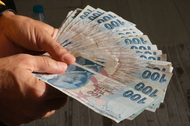 istock Turkish banknotes . Paying money. Turkish Lira - TRY or TL 1438987355