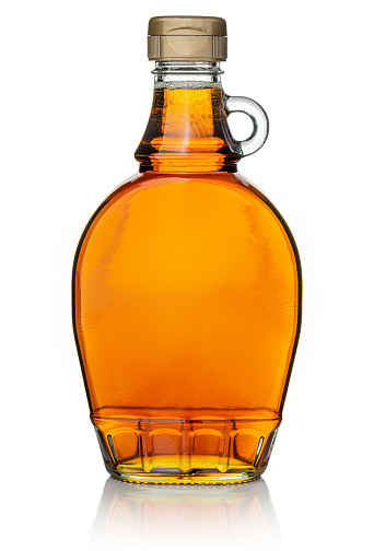 Maple syrup bottle. 
Insert your own label or text. 
Isolated on white.