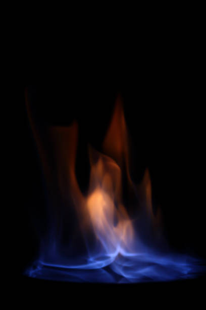istock Abstract background - flames against black background 1438988382