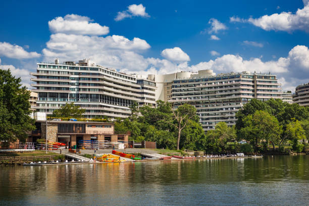 Thompson Boat Center and Watergate Hotel in Georgetown The Thompson Boat Center and Watergate Hotel at the Georgetown waterfront in Washington, DC from the Potomac River during the summer hotel watergate stock pictures, royalty-free photos & images