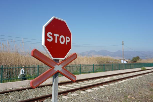istock Stop warning sign on the rails in the station 1439000921