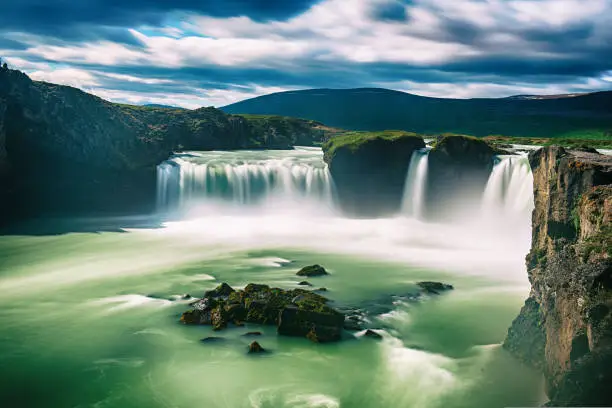 Godafoss waterfall in Iceland, summer natural travel background