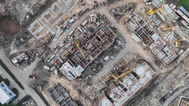 istock Construction site of low-rise brick houses in summer time 1439006686