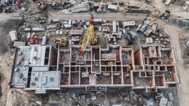 istock Construction site of low-rise brick houses in summer time 1439006688