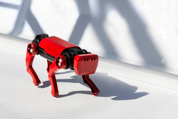 Red robot dog, suitable for industrial detection and remote operation white shadows background stock photo