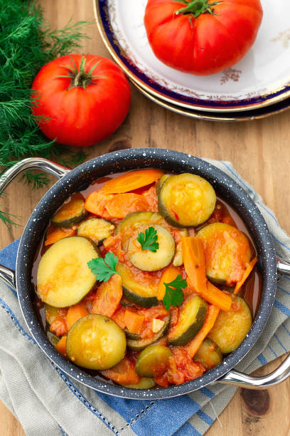 istock Vegetarian zucchini stew with carrots and tomatoes 1439011922