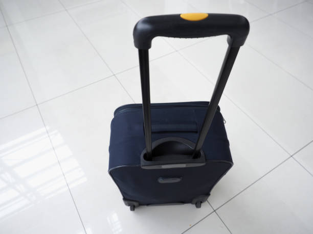 istock luggage on airport floor 1439013059