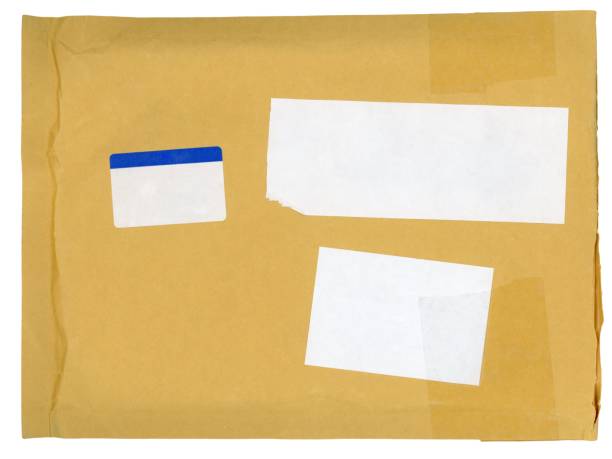 istock yellow mail letter envelope with blank labels isolated over whit 1439013328