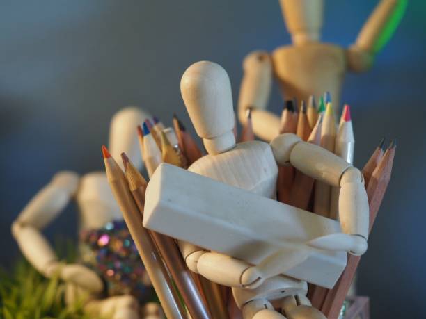istock Wooden Drawing Models with Colored Pencils 1439020451