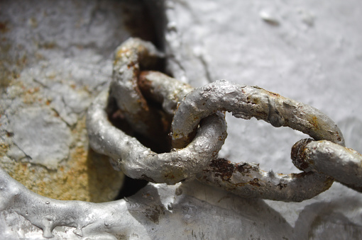 Old padlock on a window at Forte de Copacabana in the city of Rio de Janeiro in Brazil