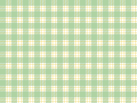 Tartan checked plaids light green and orange colors. Seamless fabric texture pastel colors.