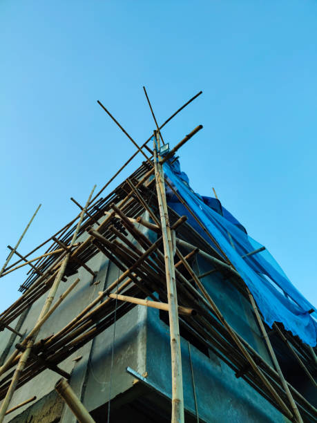 istock Building structure with bamboo ladder in the morning. 1439026808