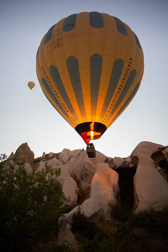 Magnificent view of hot air balloon flights in Cappadocia, Turkey September 03, 2018. Beautiful view of the balloons in Cappadocia taking off at sunrise.