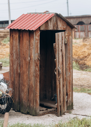 Old wooden toilet in the village