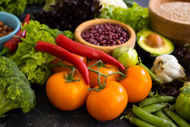 istock Different vegetables, fruits, cereals on the old background 1439033107