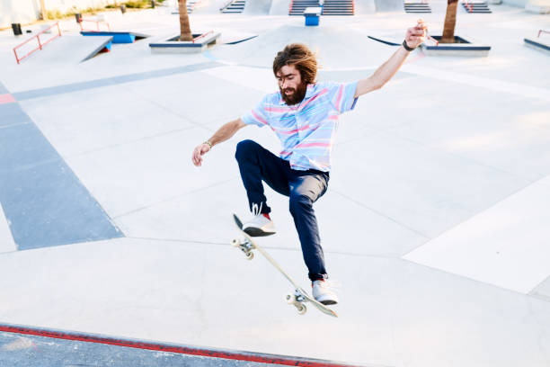 istock Skater jumping on board 1439034782