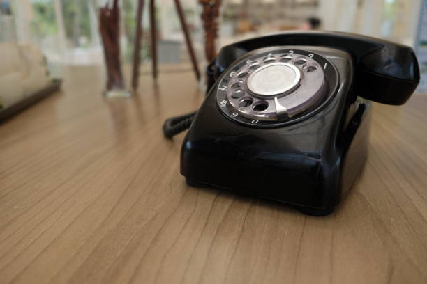 istock Old black retro rotary Telephone 1439036089