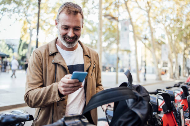 istock Mature tourist renting an e-bike 1439052671