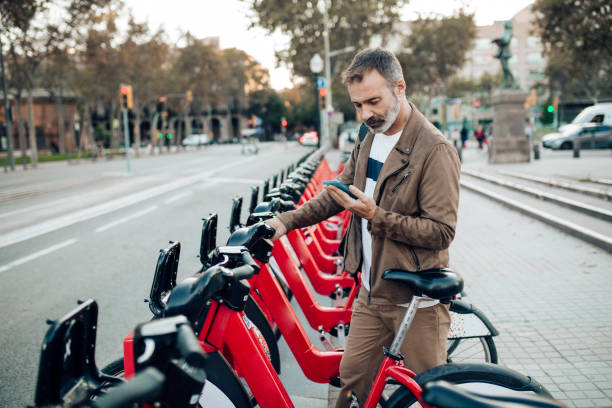 istock Mature tourist renting an e-bike 1439052748