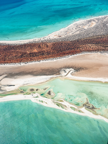 Aerial view of tidal dunes and water inlet Shark Bay Western Australia taken from a small plane