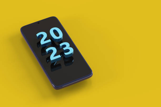 istock Mobile phone with 2023 text in three dimensions. New year concept. Isometric projection. 3d illustration. 1439073973