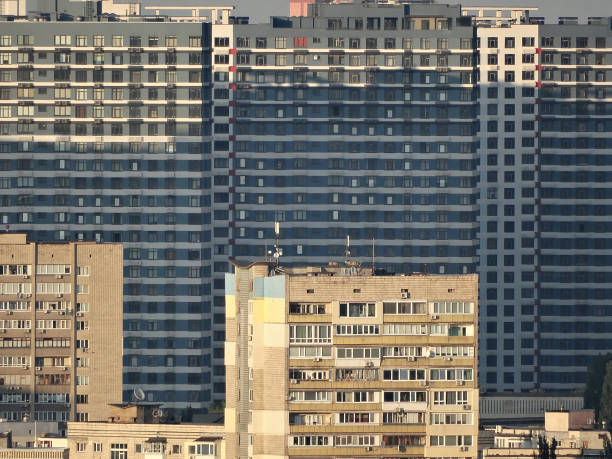 istock Beautiful exterior office building and architecture with window pattern. high rise residential building in the city. dense urban development facades 1439075792