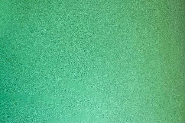 istock Abstract green concrete cement wall texture and background. 1439088560