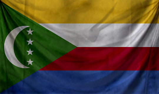 Comoros flag waving Background for patriotic and national design