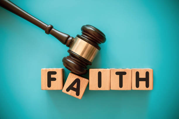 istock Gavel and wood block with FAITH 1439117712