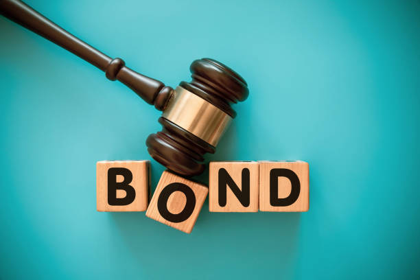 istock Gavel and wood block with BOND 1439120709