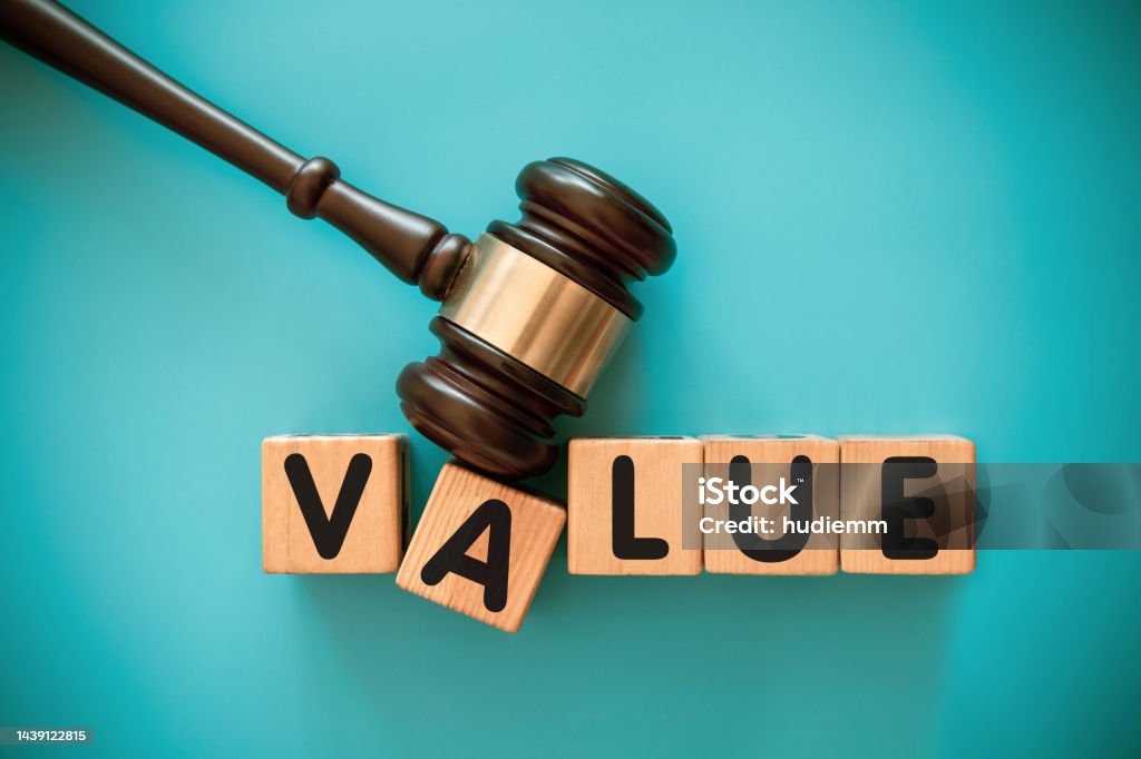 Gavel and wood block with VALUE Alphabet Stock Photo