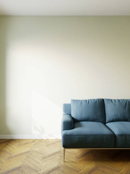 istock Empty interior mockup with sofa and wall. Blue sofa in the interior, with free space on the wall. 3d rendering 1439125693