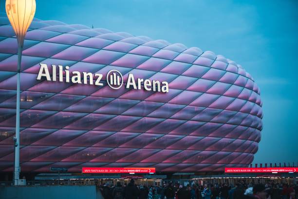 FCB Fans Allianz Arena Munich, Germany – January 25, 2020: Fans walking to Allianz Arena, home stadium of famous german football club FC Bayern München to see a soccer match. allianz arena stock pictures, royalty-free photos & images