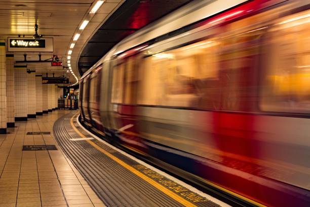 istock Metro station and a red and white metro in a motion 1439129828