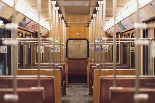 Munich, Germany – January 25, 2020: Interior of old vintage subway trains in Munich. Bavarian people commuting daily with these trains. Empty subway train