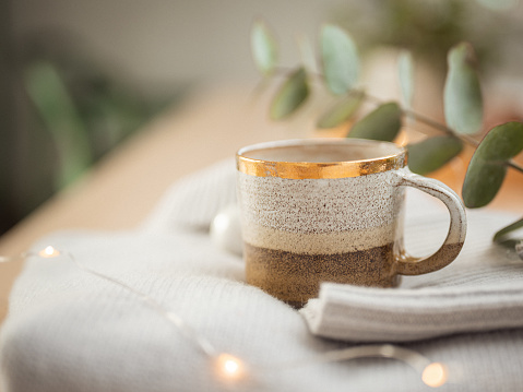 Christmas coffee still life
Simple bright photo of coffee on cozy sweater