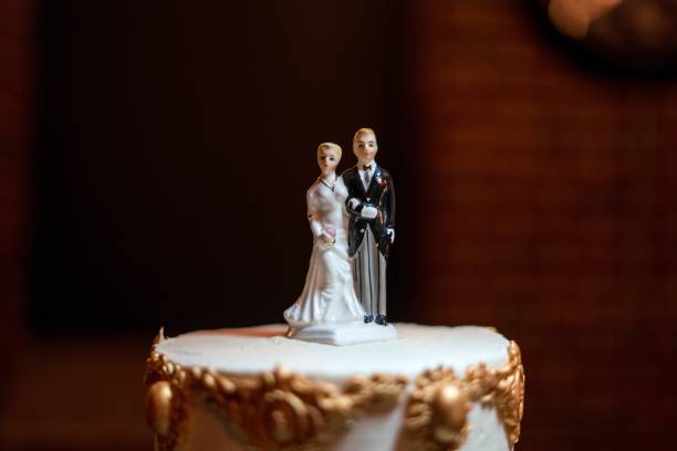 istock Selective focus shot of a wedding cake topper with a blurred background 1439131465