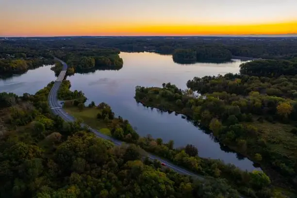 An aerial view of a highway road next to Seneca Lake at sunrise, Gaithersburg, Maryland, United States