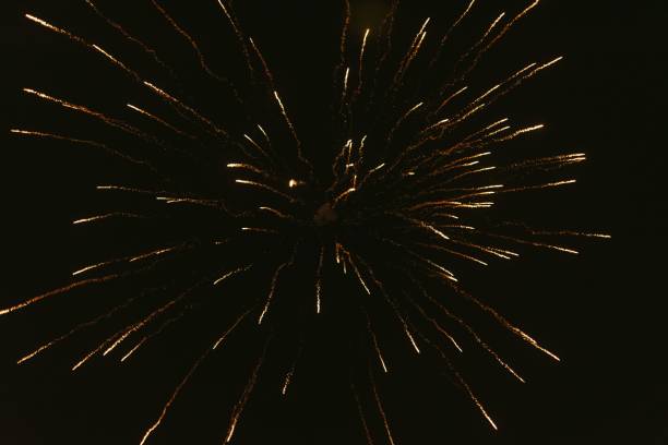 istock Border from golden sparks fireworks against the dark sky 1439133228