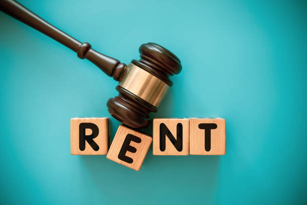 istock Gavel and wood block with RENT 1439133792