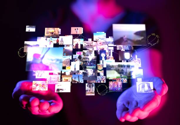 istock Businessman creating a visual projection of multimedia streaming entertainment 1439134068