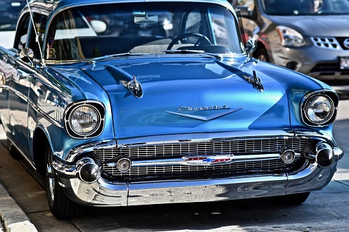 Downers Grove, United States – June 07, 2019: A beautiful shot of a blue chevrolet car with a blurred background