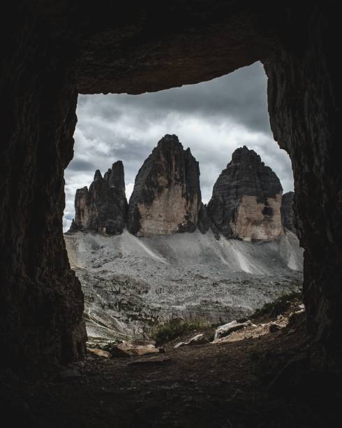istock Aerial view of huge mountains under cloudy sky 1439136569